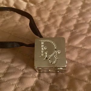Dior Silver bag charm with Black Ribbon